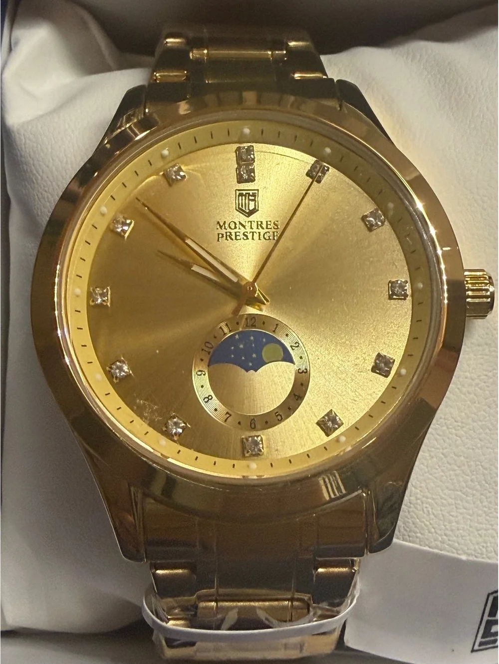 Montres Prestige gold-tone watch with moonphase dial